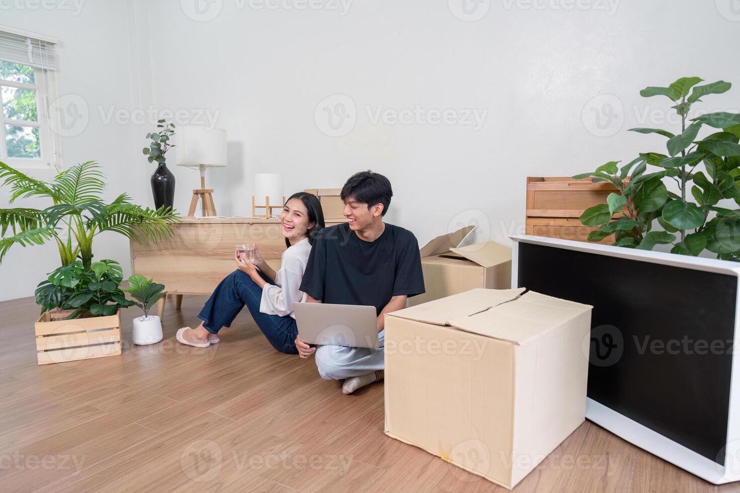 Couple Enjoying Relaxed Moments During Home Move-In Process photo