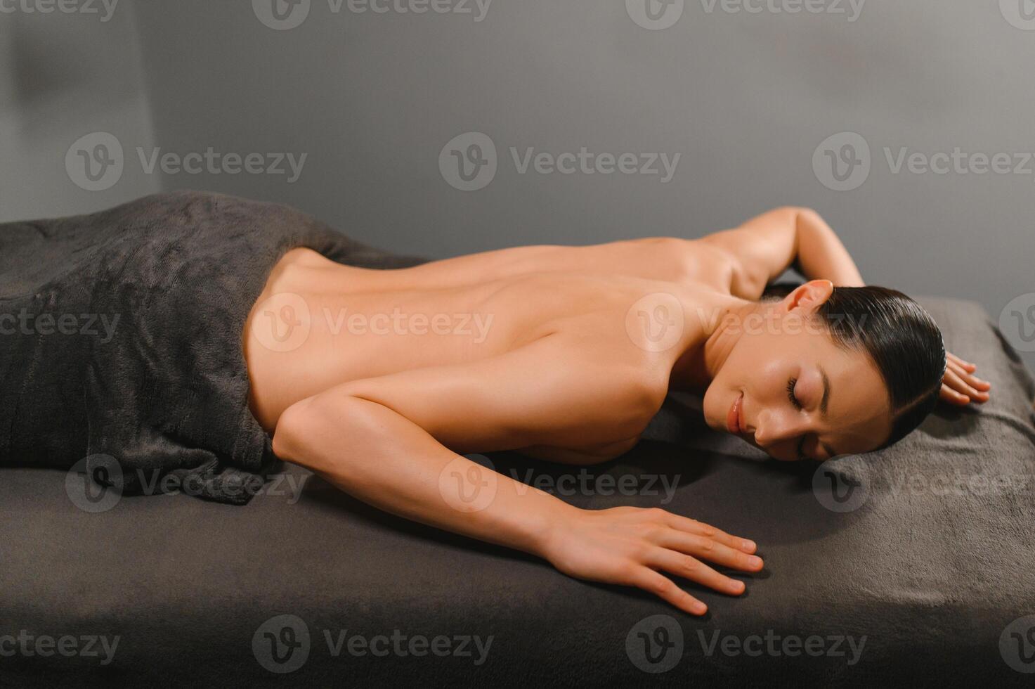 beautiful woman relaxing in spa photo
