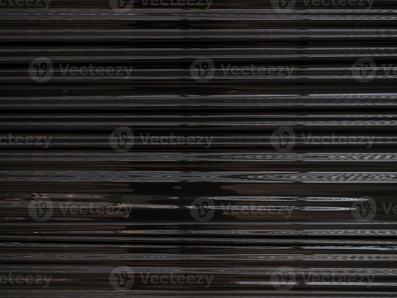 industrial style glossy black plastic texture background photo