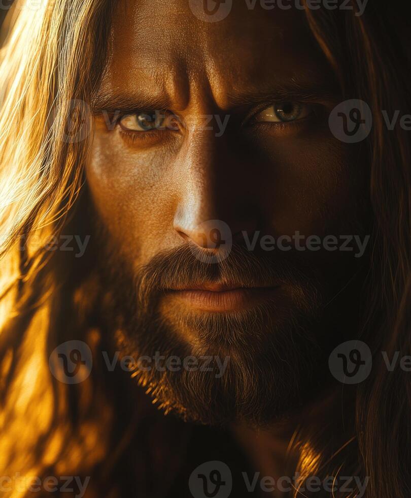 Portrait of Jesus Christ with flowing hair and intense gaze during sunset photo