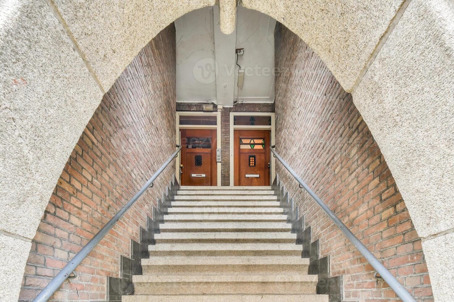 A stairway with a door on the side photo