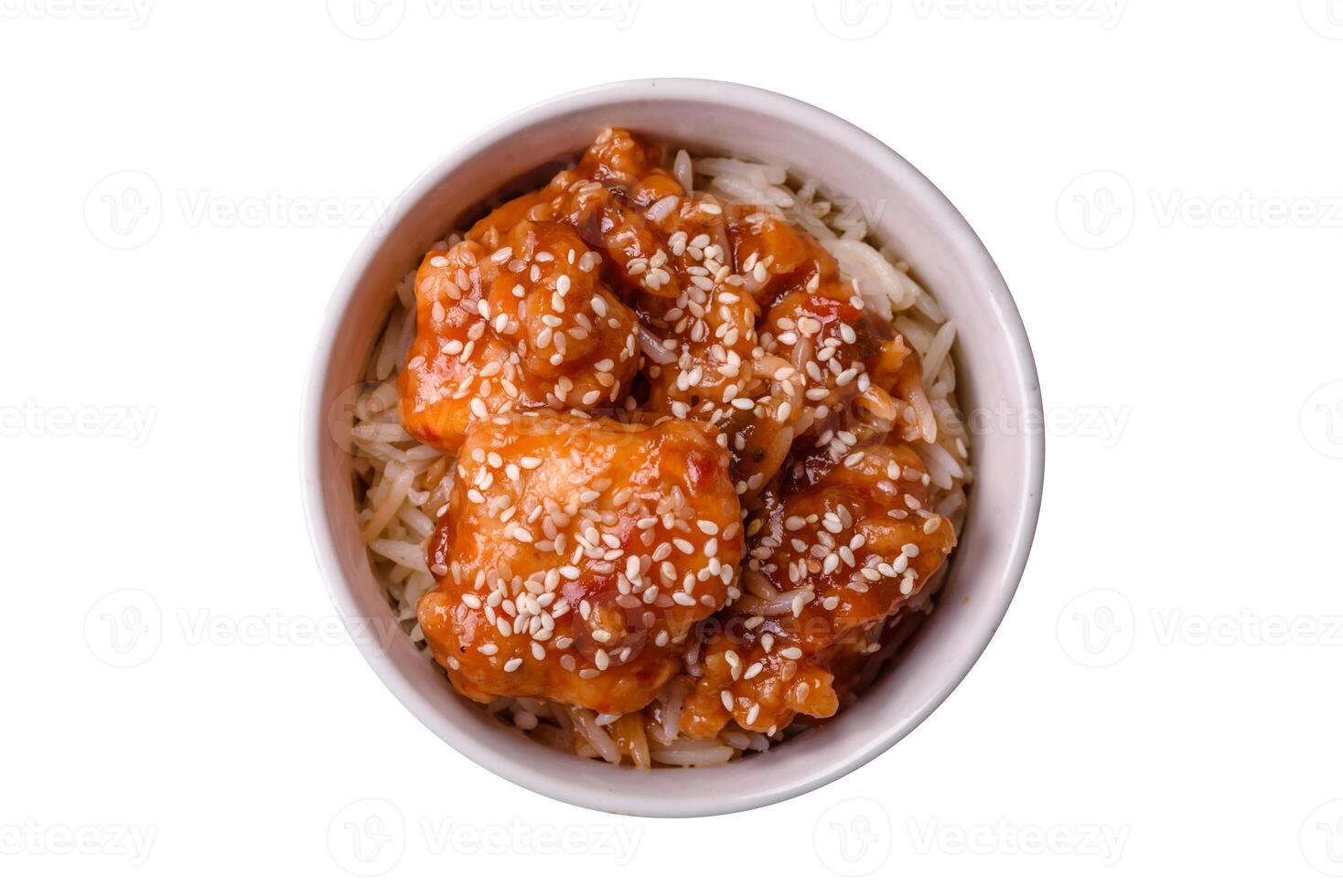 Asian food boiled rice with meat with sweet and sour sauce, spices and herbs photo