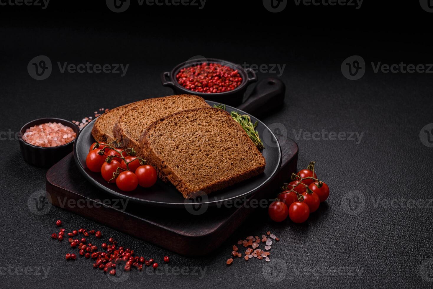 Fresh crispy brown bread sliced from whole grain flour photo