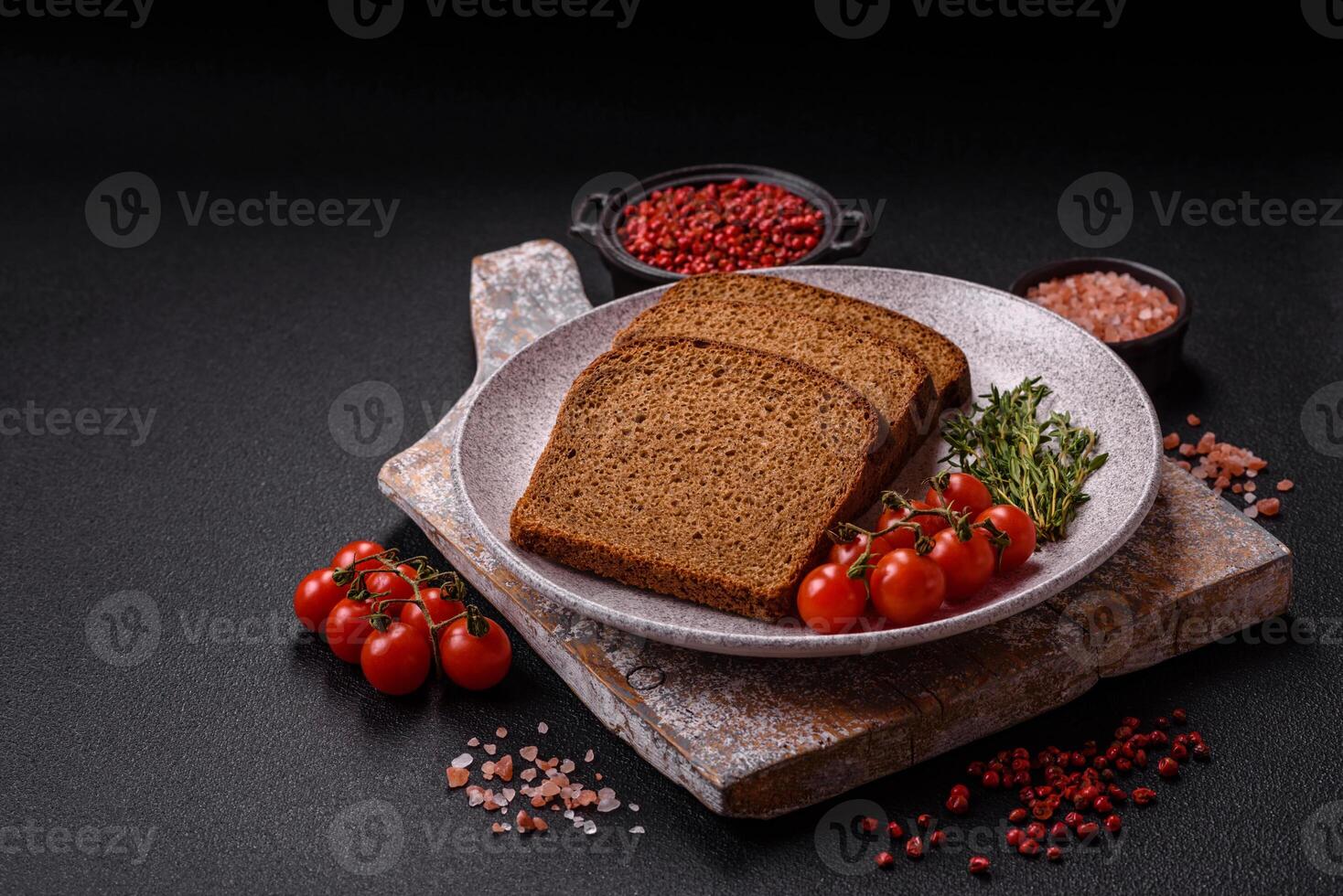 Fresh crispy brown bread sliced from whole grain flour photo