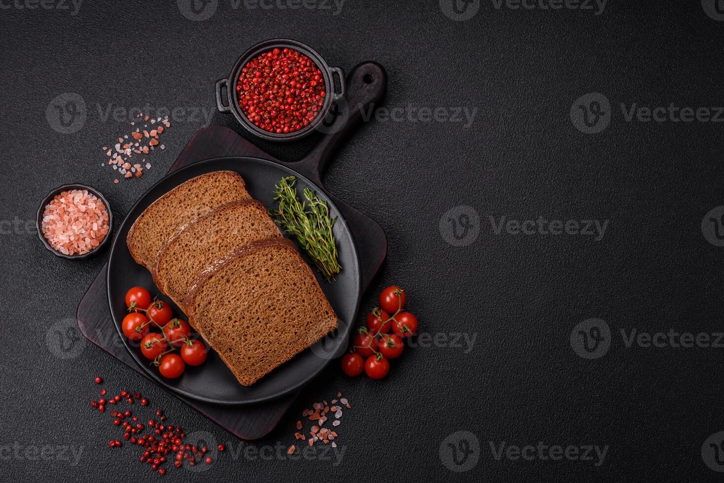 Fresh crispy brown bread sliced from whole grain flour photo