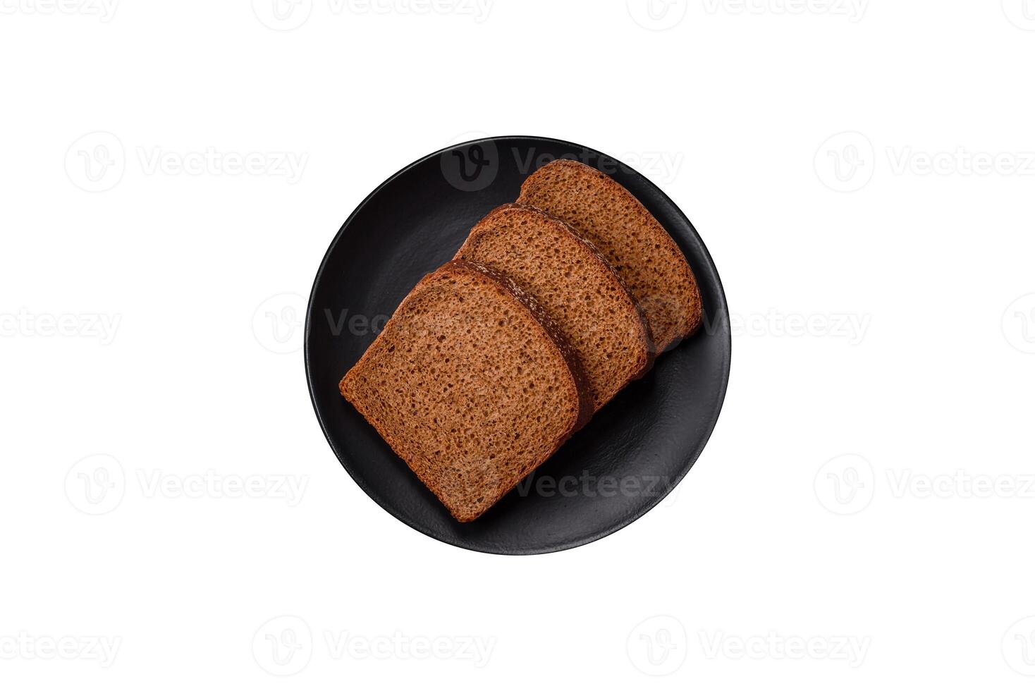 Fresh crispy brown bread sliced from whole grain flour photo