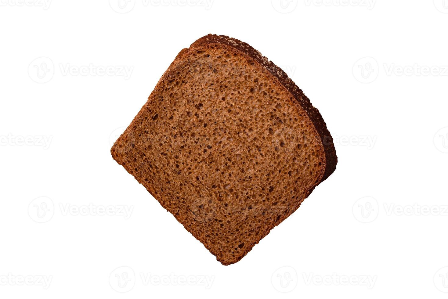 Fresh crispy brown bread sliced from whole grain flour photo