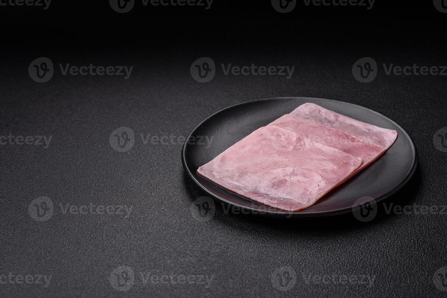 Ham cut into square slices for making delicious nutritious sandwiches photo