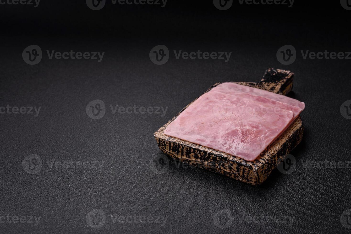 Ham cut into square slices for making delicious nutritious sandwiches photo