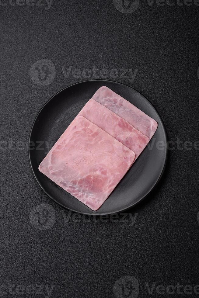 Ham cut into square slices for making delicious nutritious sandwiches photo