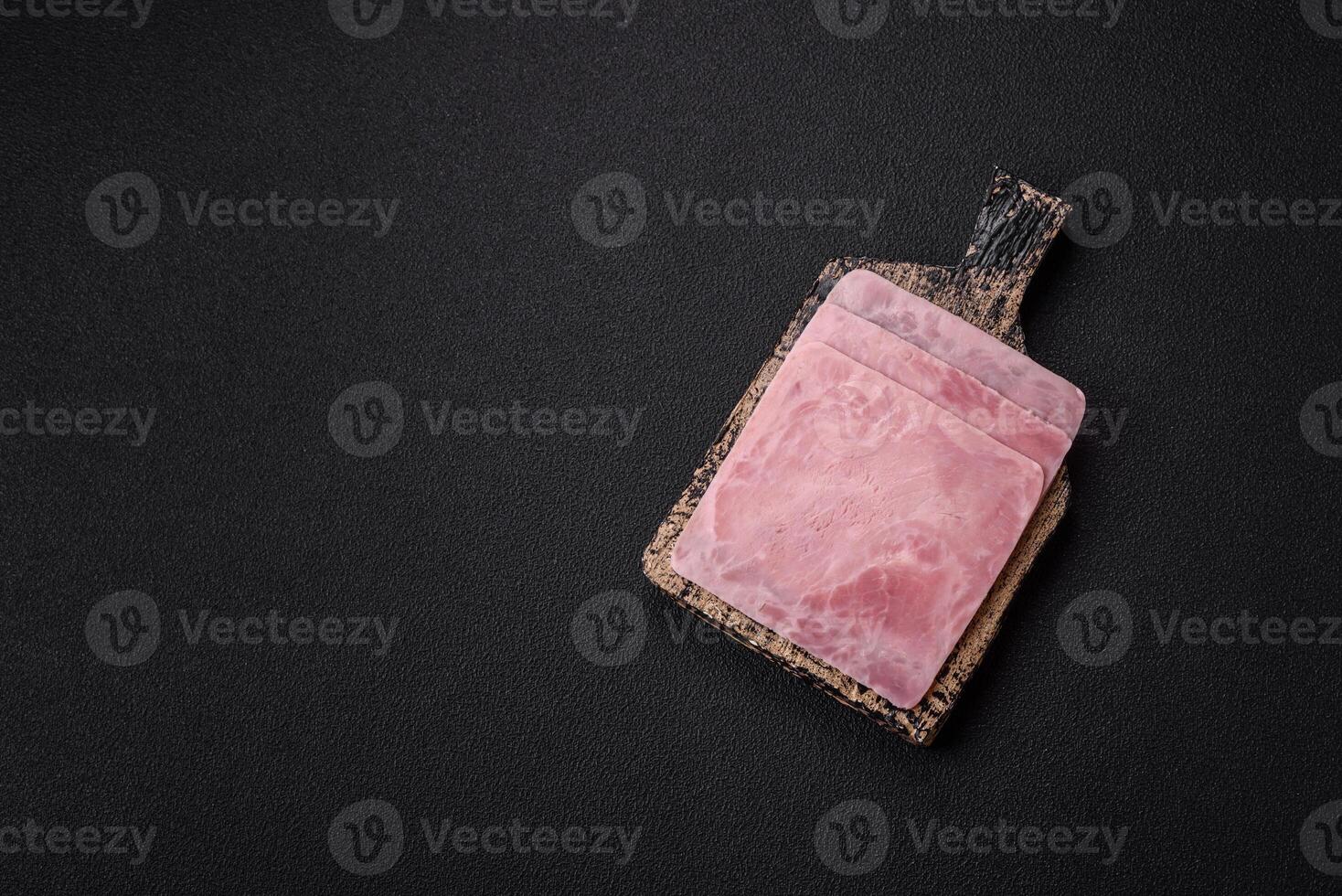 Ham cut into square slices for making delicious nutritious sandwiches photo