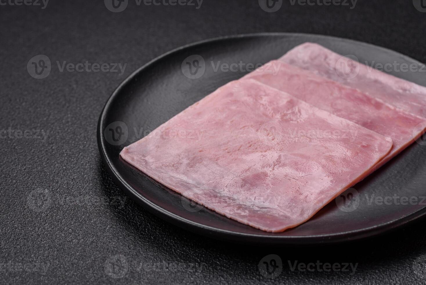 Ham cut into square slices for making delicious nutritious sandwiches photo