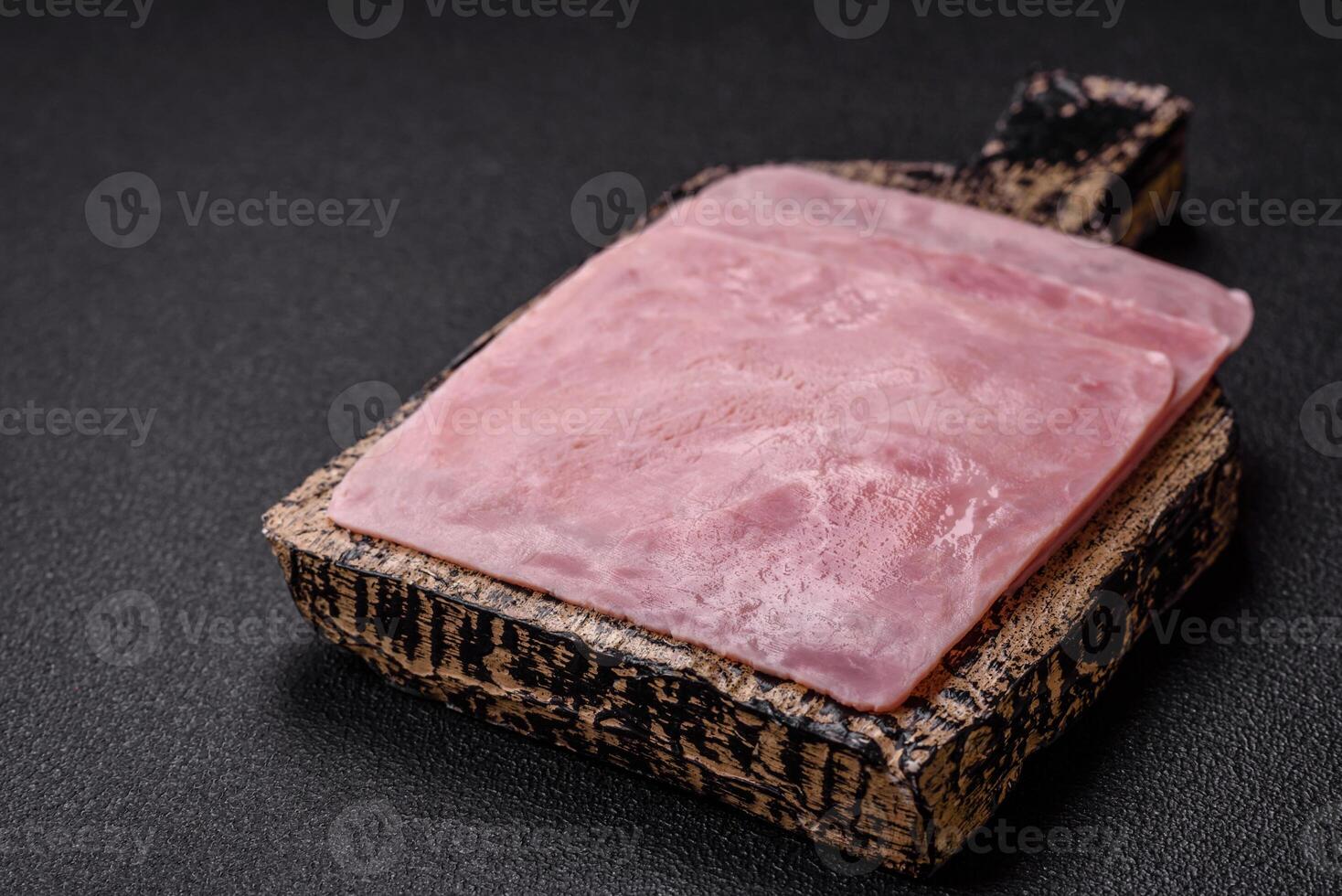 Ham cut into square slices for making delicious nutritious sandwiches photo