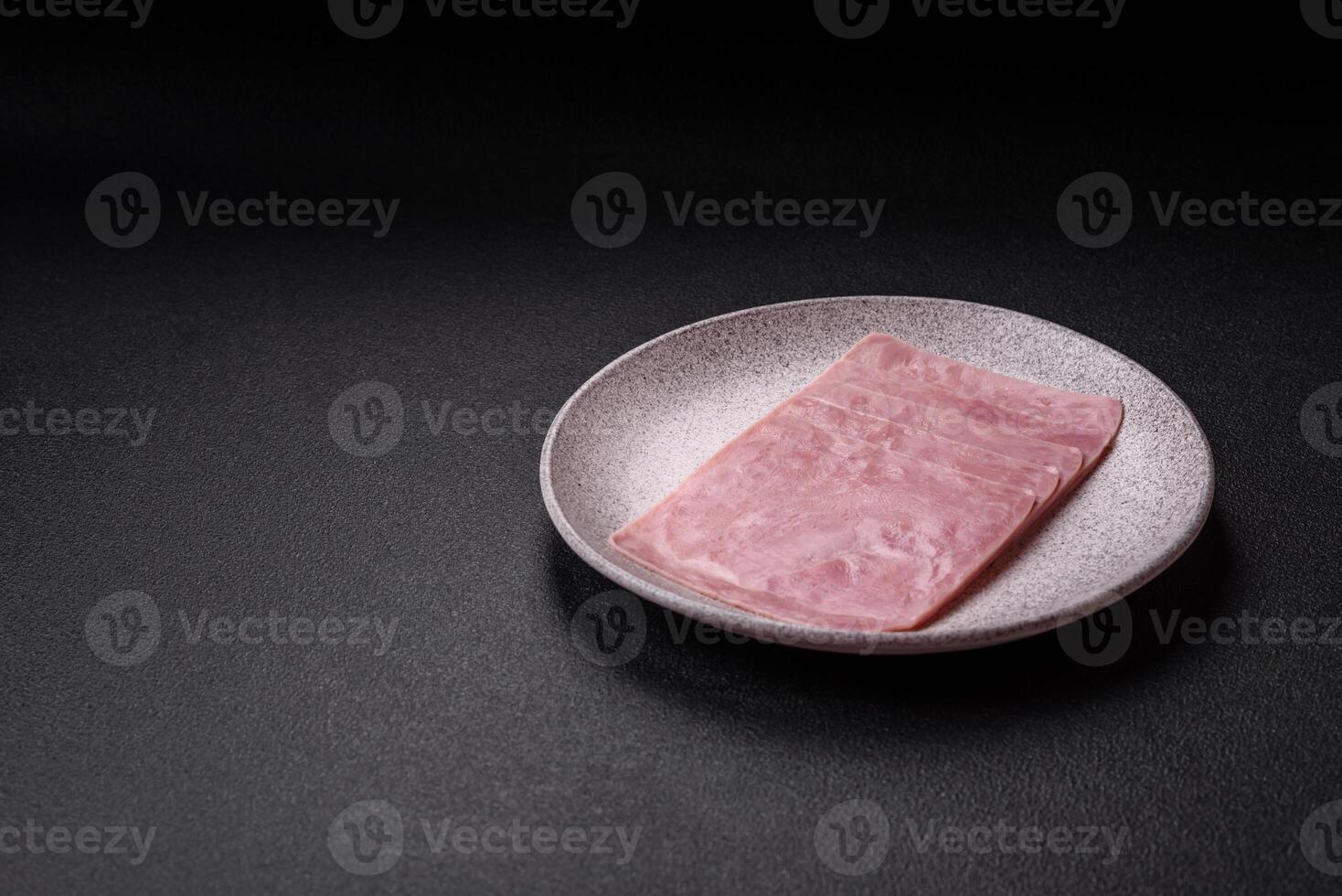 Ham cut into square slices for making delicious nutritious sandwiches photo