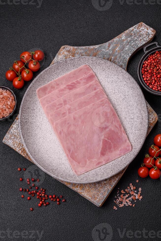 Ham cut into square slices for making delicious nutritious sandwiches photo