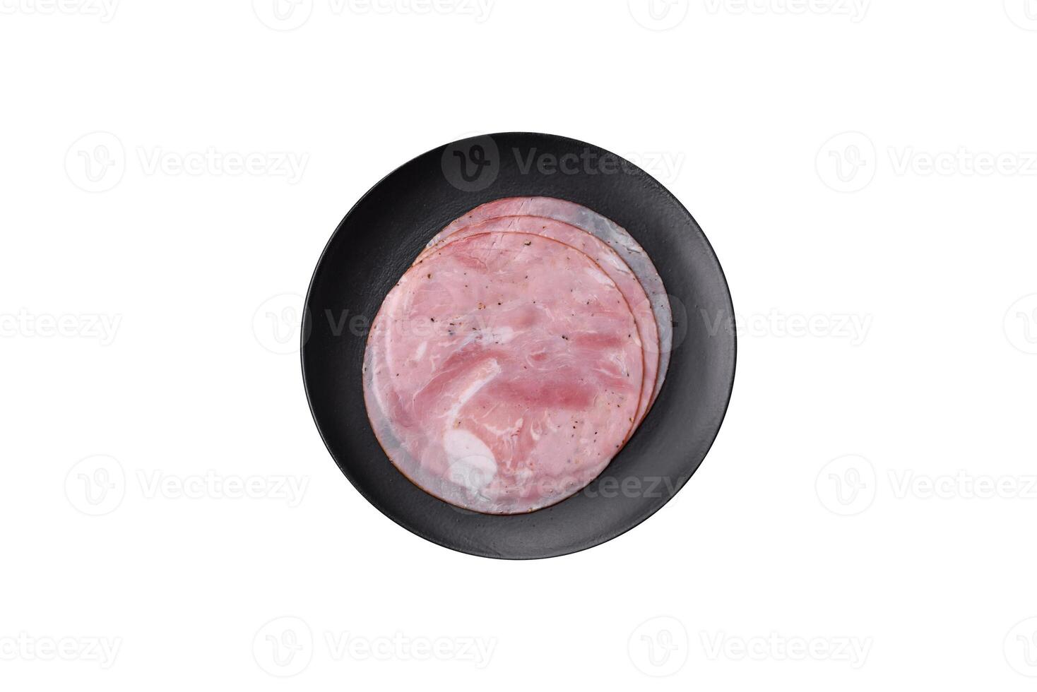 Ham cut into round slices with salt, spices and herbs photo