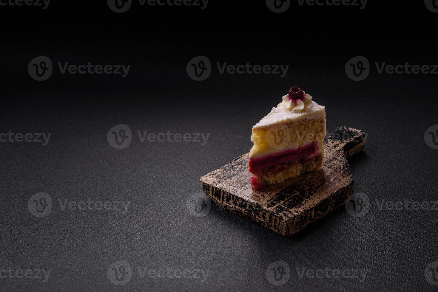 Sweet delicious cake with a layer of raspberry jam photo
