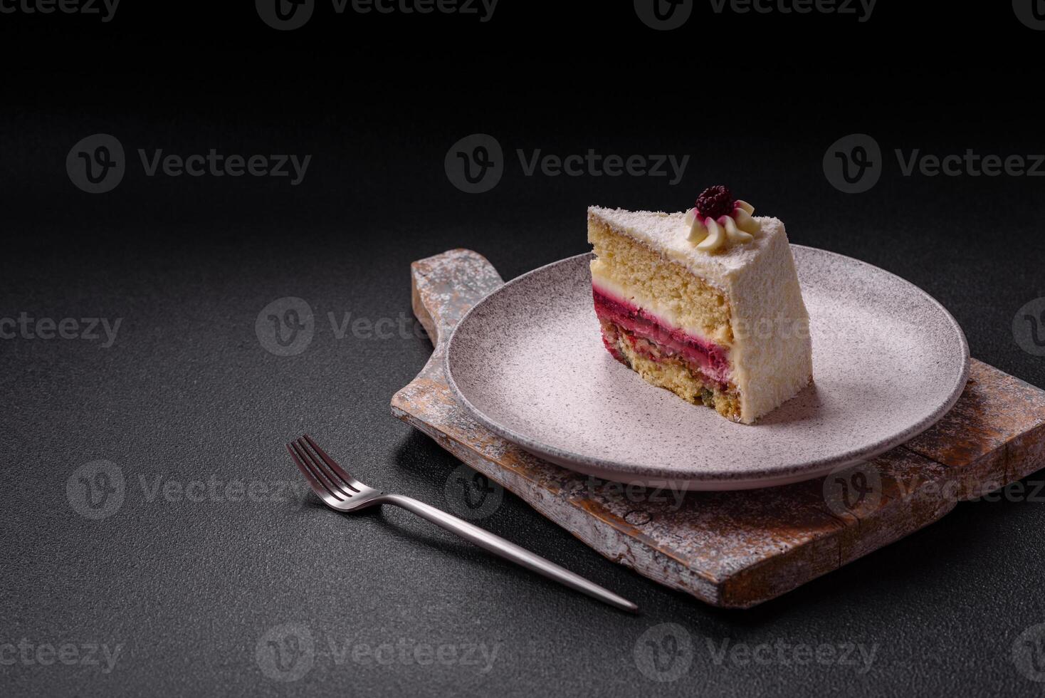Sweet delicious cake with a layer of raspberry jam photo