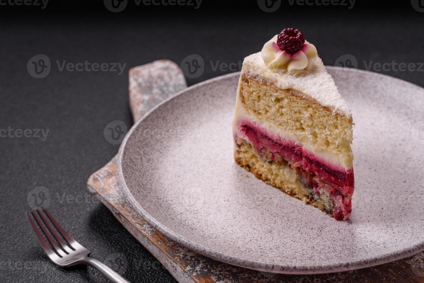 Sweet delicious cake with a layer of raspberry jam photo