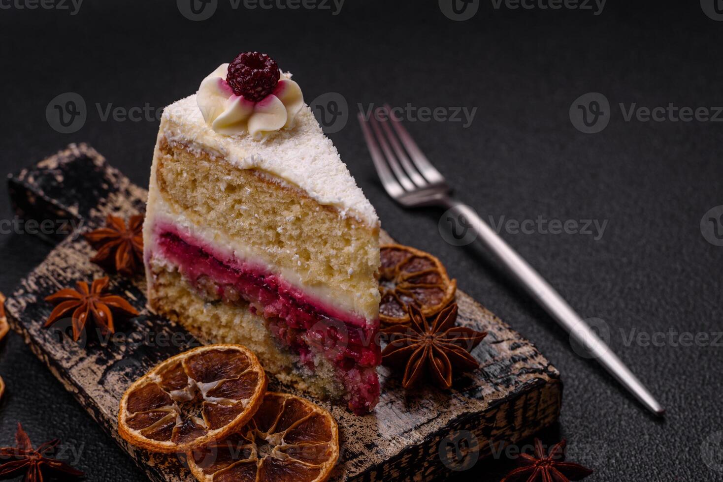 Sweet delicious cake with a layer of raspberry jam photo