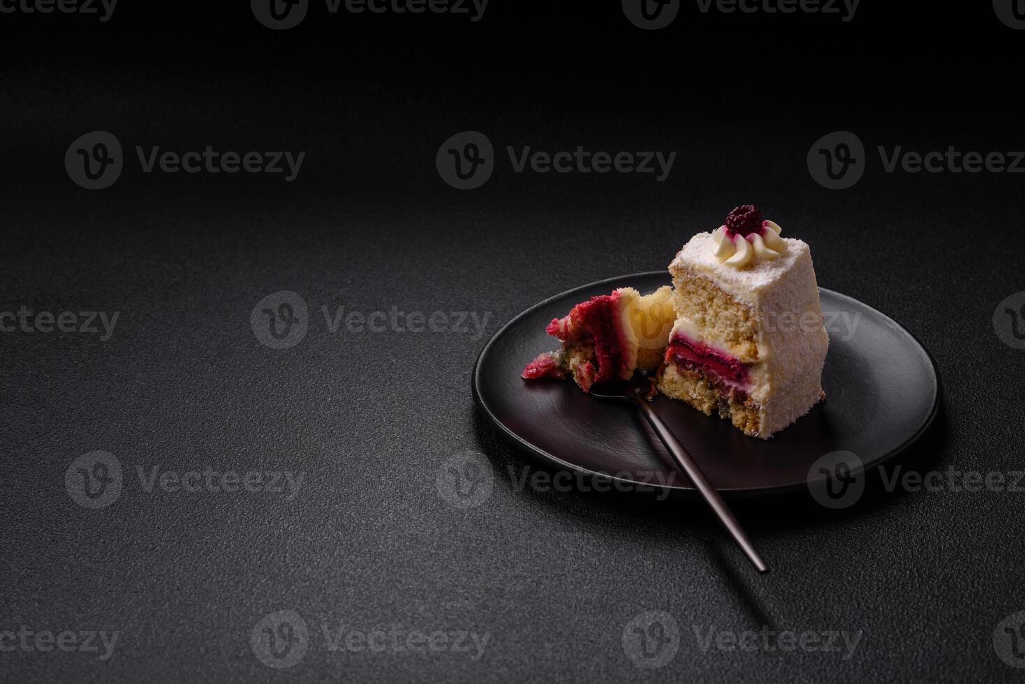 Sweet delicious cake with a layer of raspberry jam photo