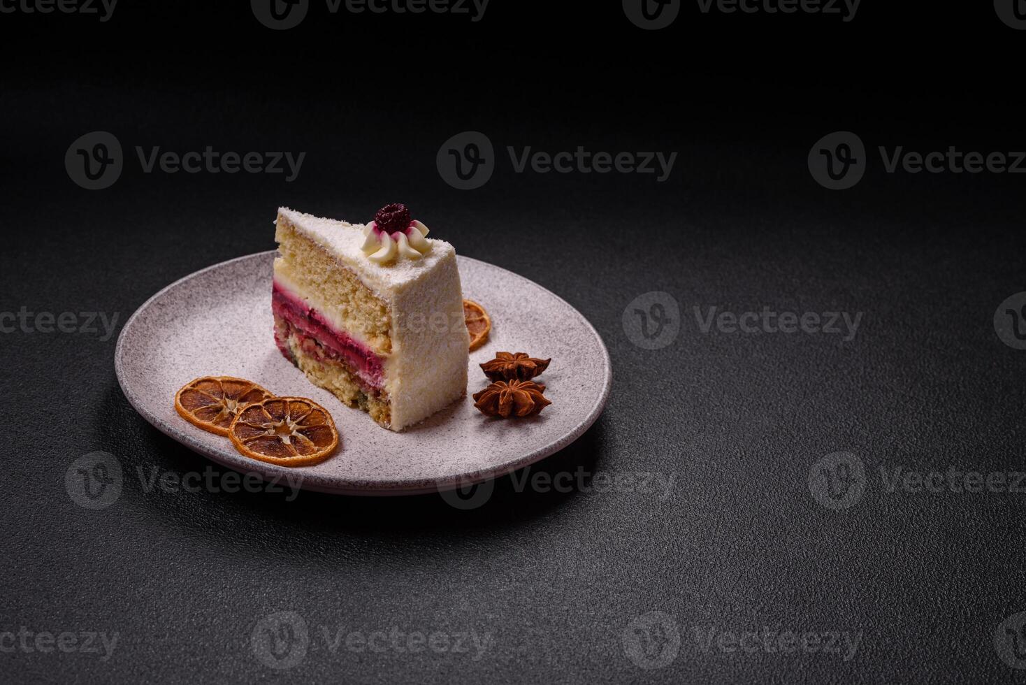 Sweet delicious cake with a layer of raspberry jam photo