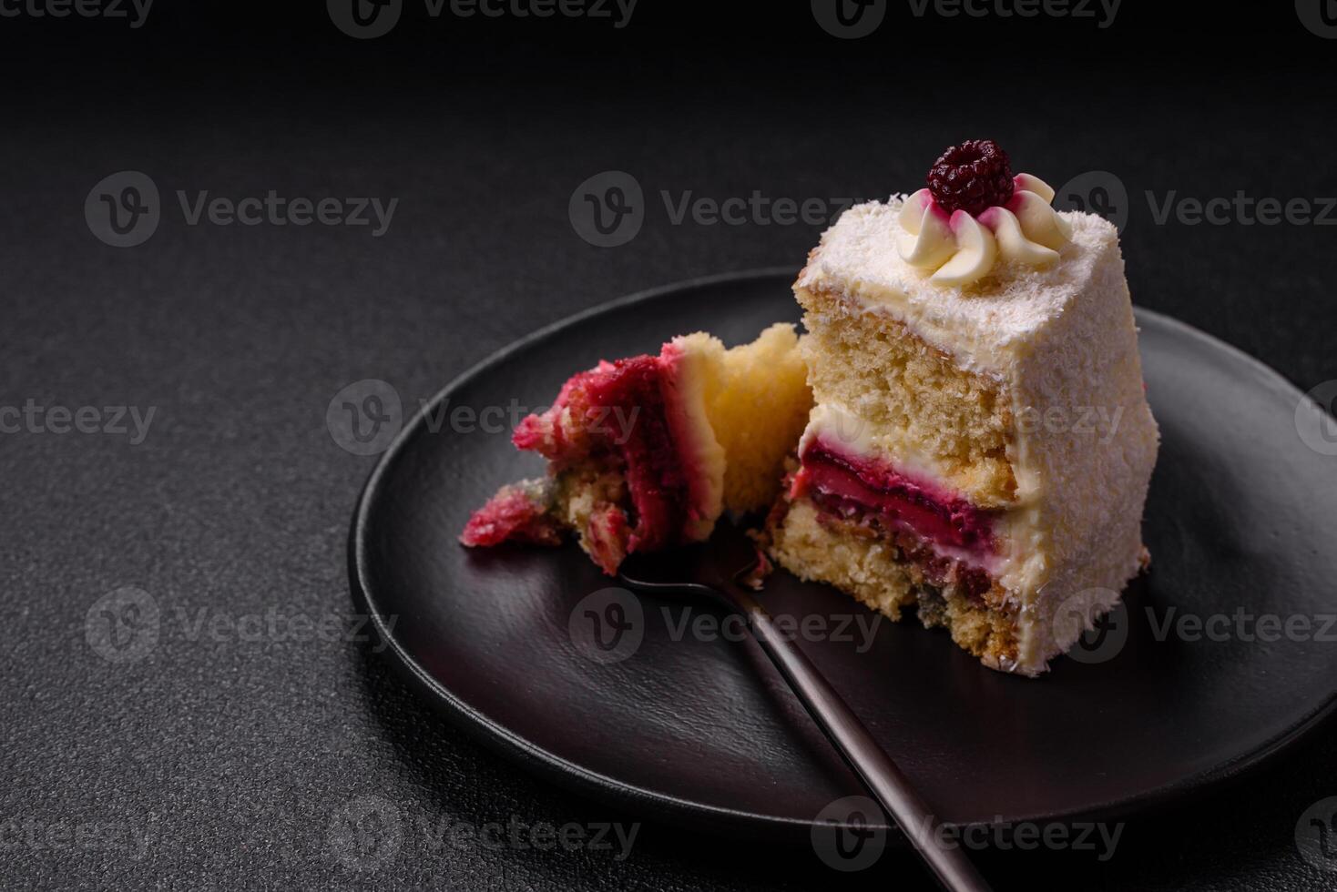 Sweet delicious cake with a layer of raspberry jam photo