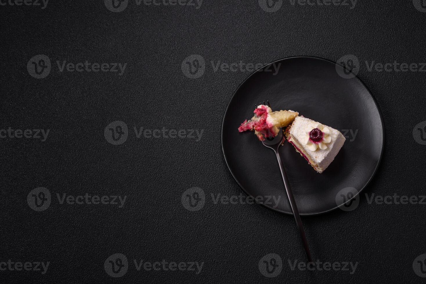 Sweet delicious cake with a layer of raspberry jam photo