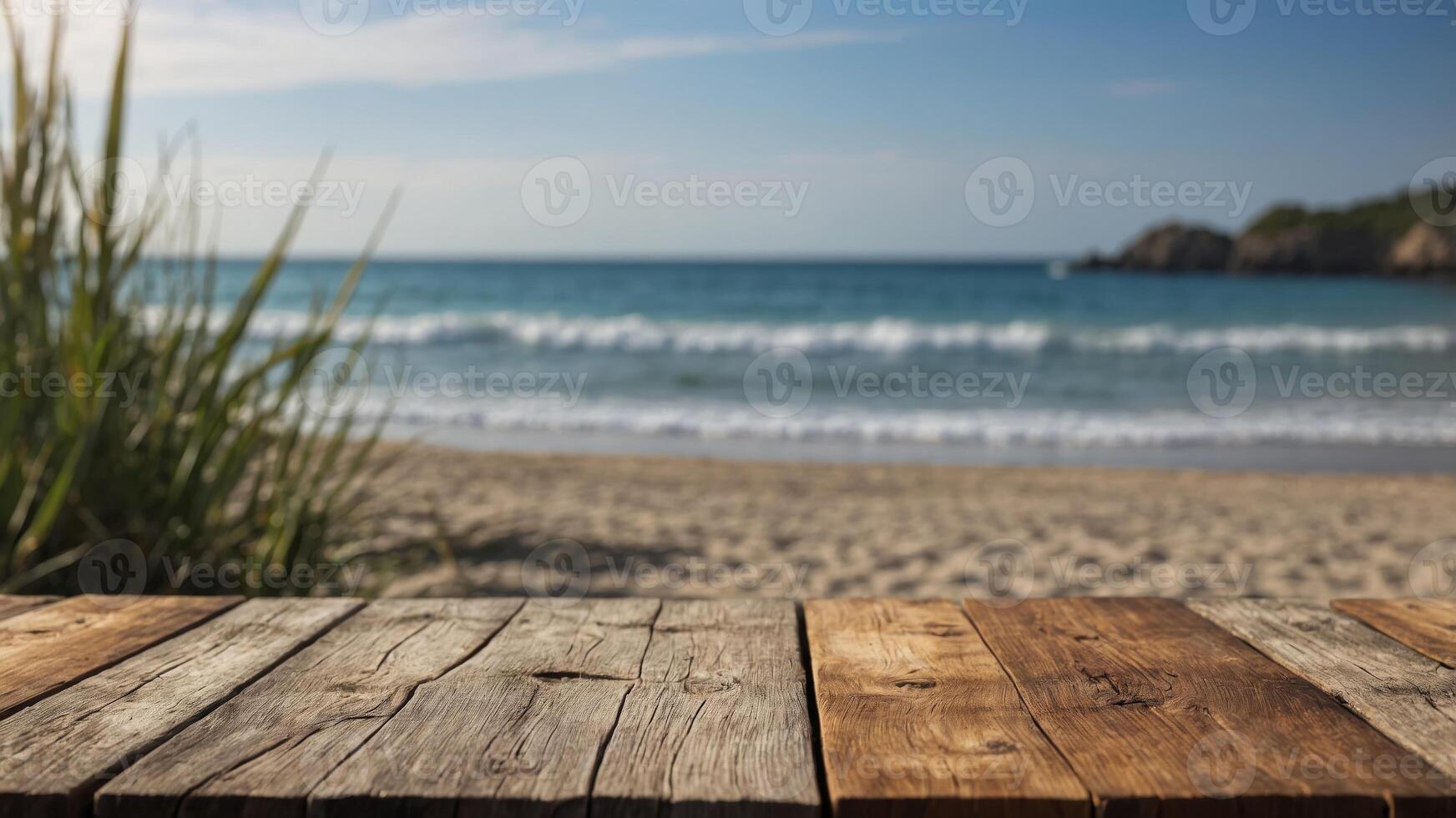Weathered wooden table with blurred beach background. photo