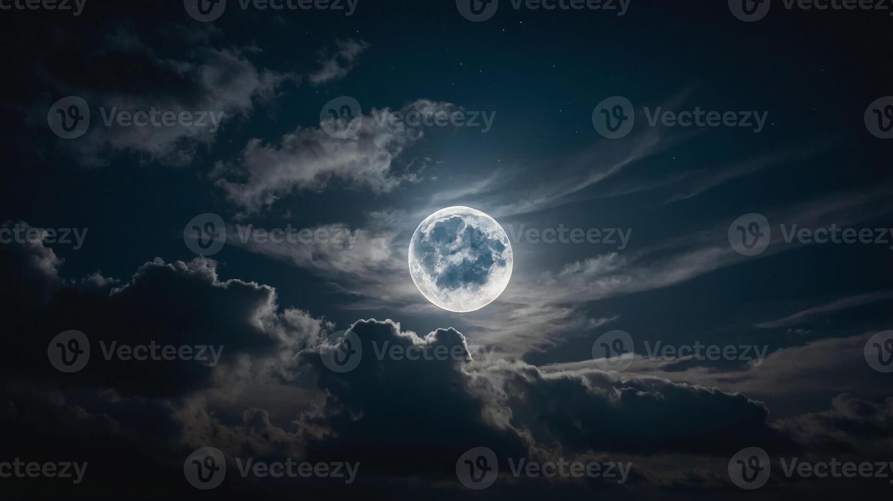 A luminous full moon obscured partially by fast-moving clouds, creating a dynamic interplay of light and shadow. photo