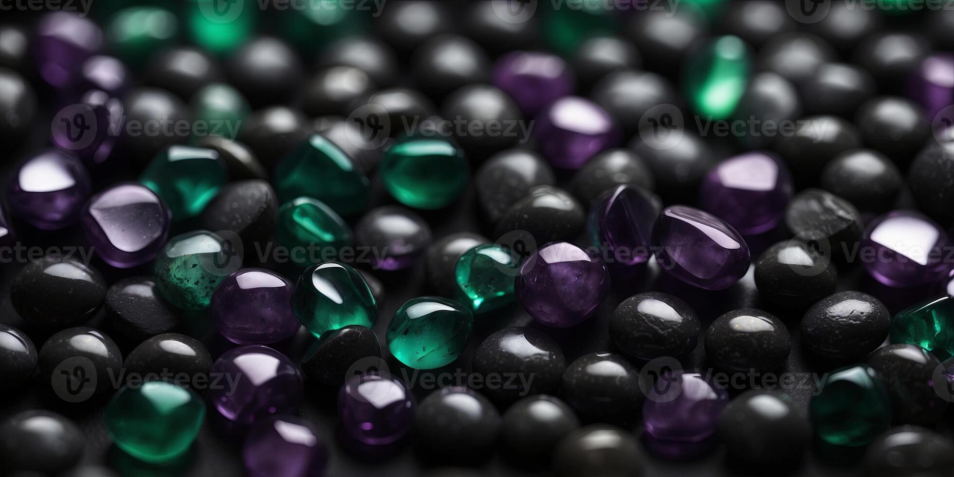 The smoothness of obsidian is highlighted by its deep black color with hints of dark green and purple shimmering throughout. photo