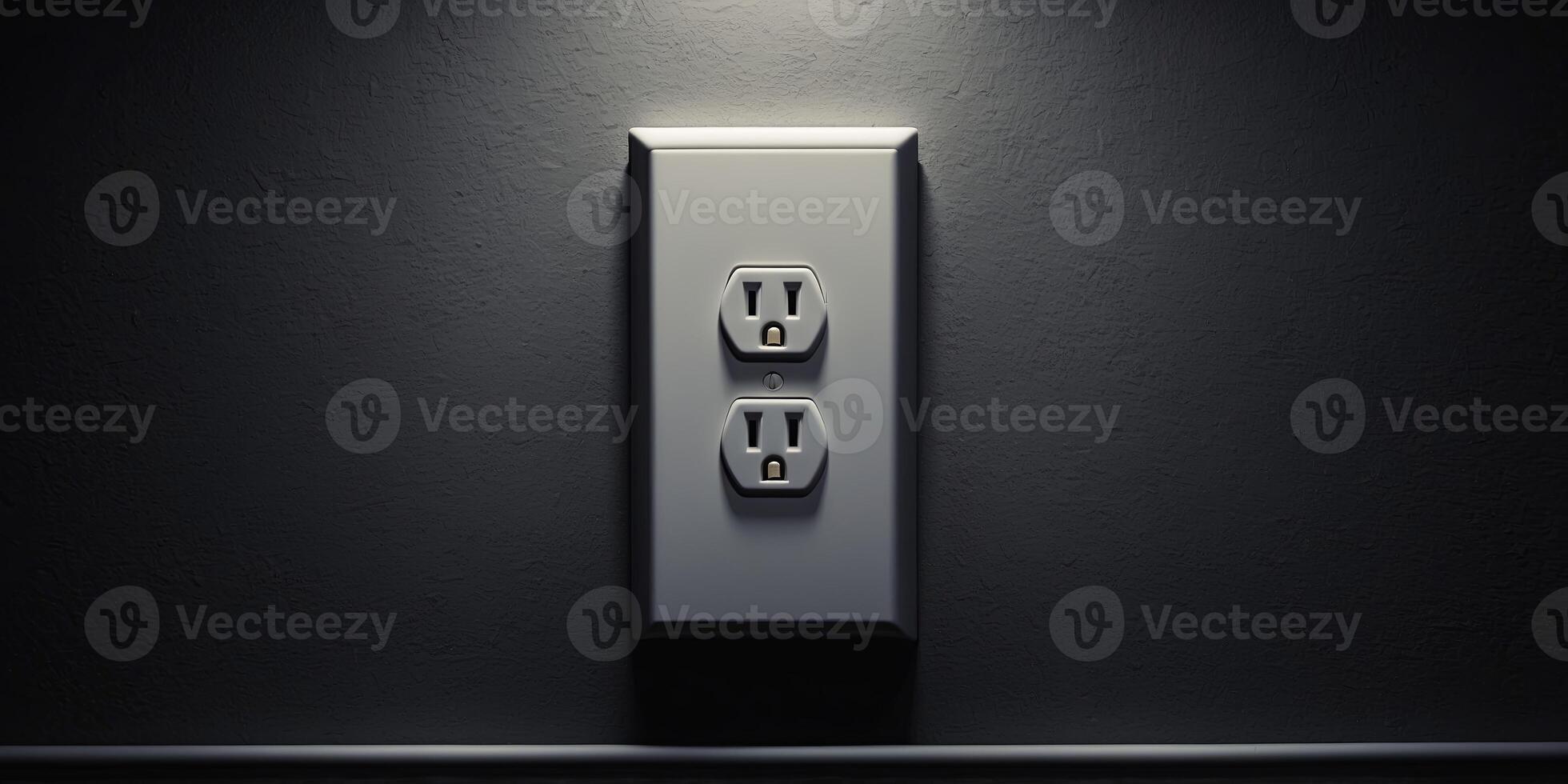 A white electrical outlet on a dark wall. photo