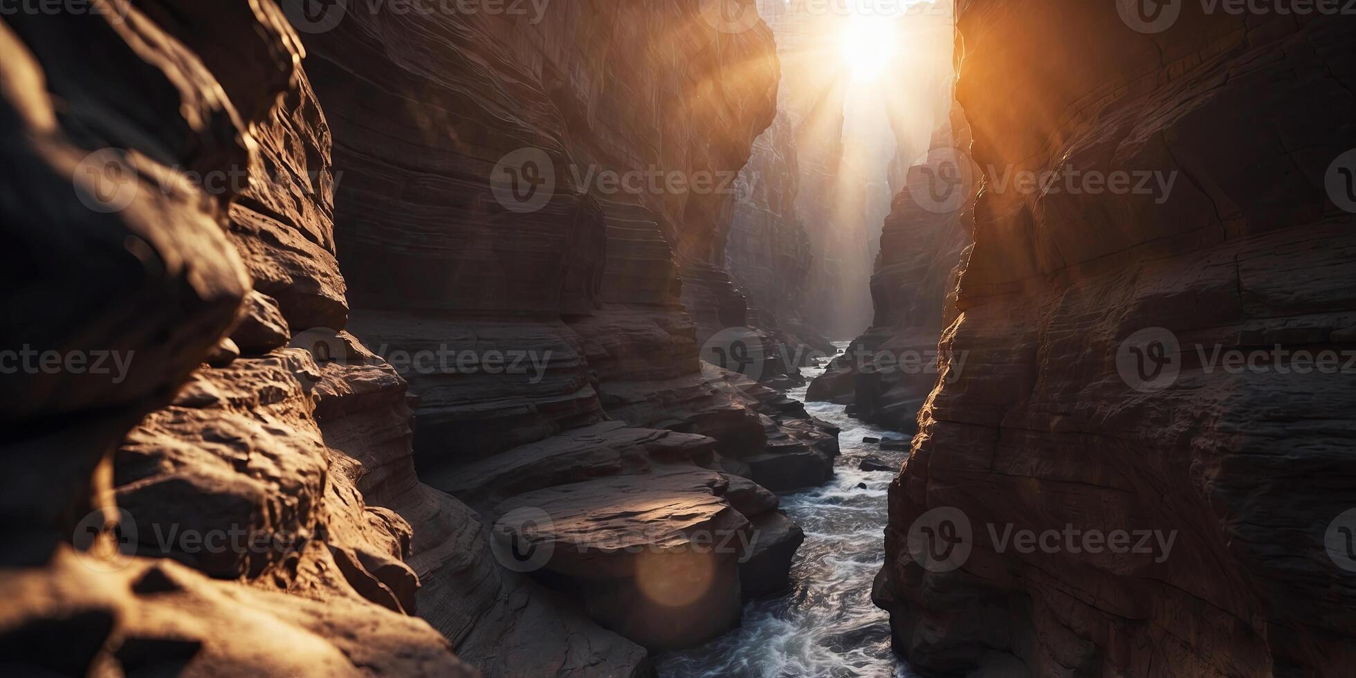 A narrow canyon with glowing sunlight at the end. photo