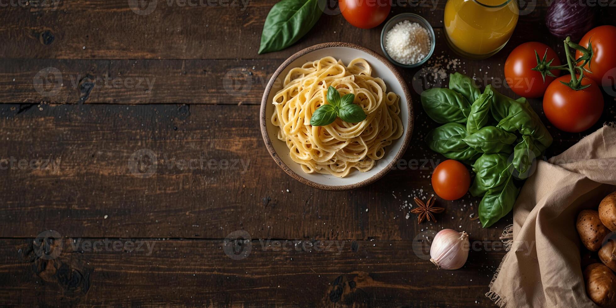 Healthy food concept with a rustic style Top view of fresh veggies pasta parmesan cheese and spices on a wooden table perfect for a copy space image. photo
