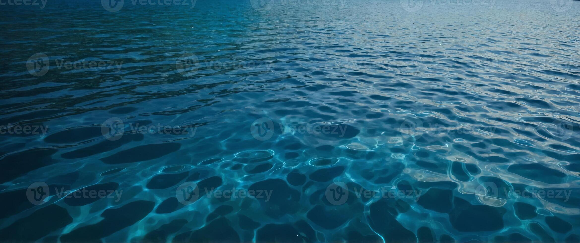 The vibrant blue hue of the water creates a serene and soothing atmosphere perfect for entering a calm and meditative state. photo