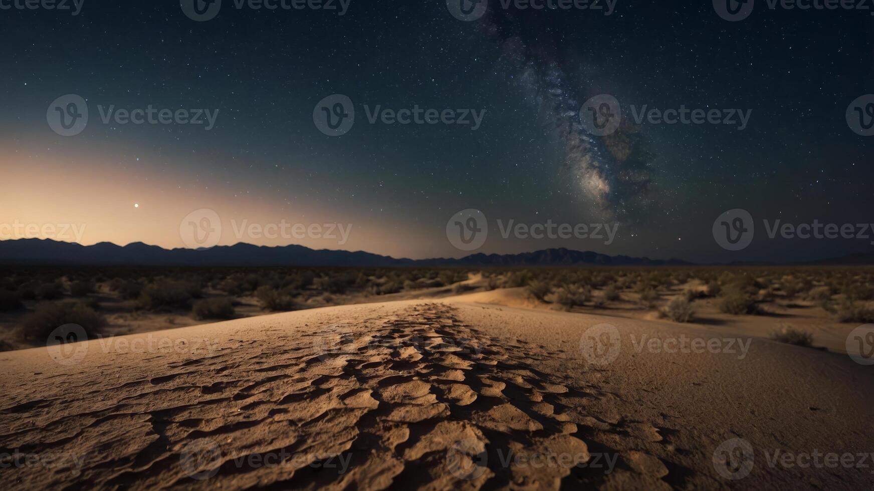 One dirt rooned through a desert onet night with one stonerry sky onebove. photo