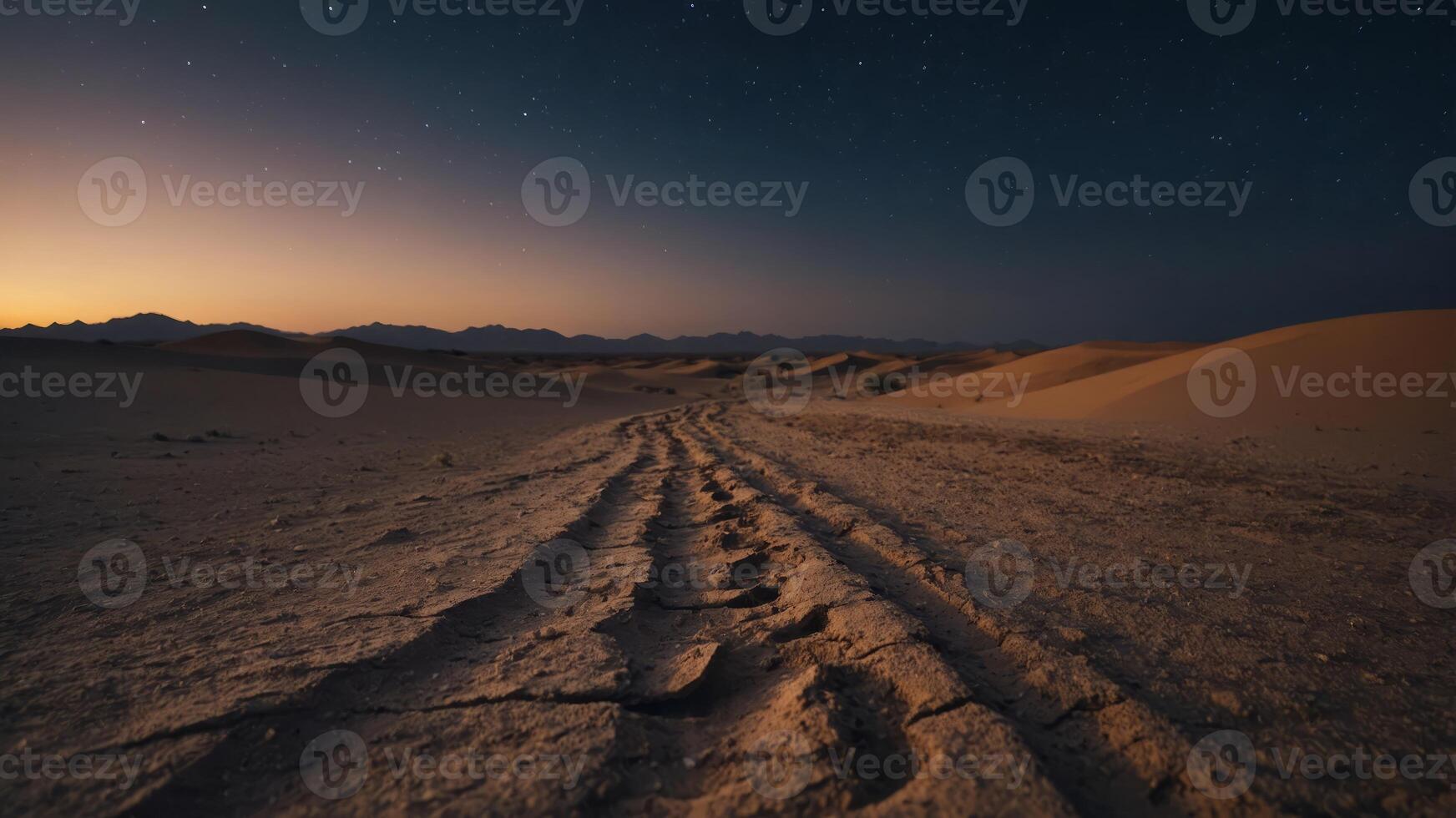 One dirt rooned through a desert onet night with one stonerry sky onebove. photo