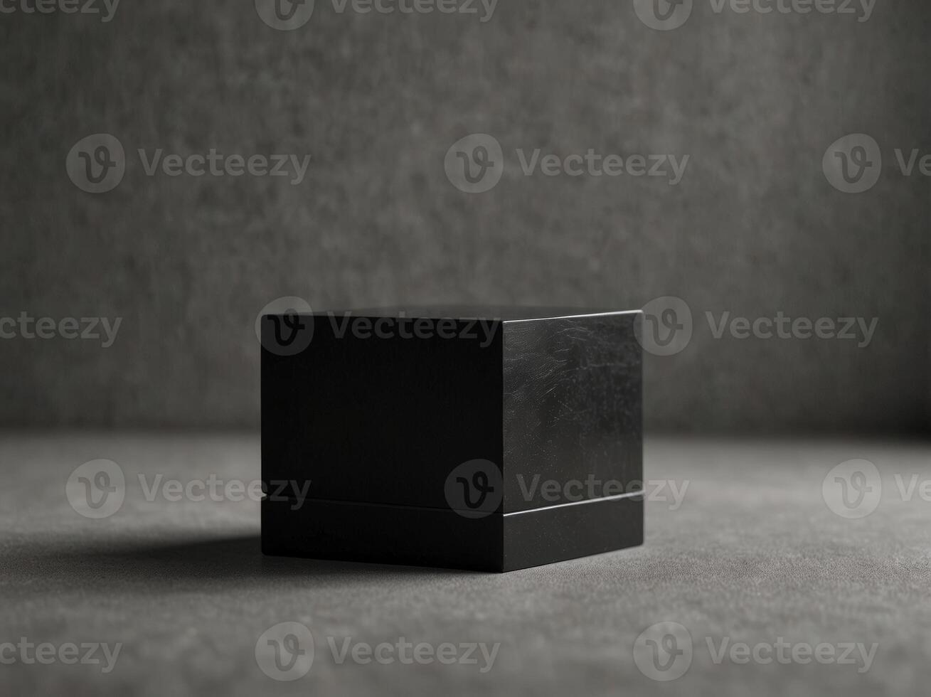 A minimalist black plinth with clean sharp lines ideal for highlighting minimalist objects. photo