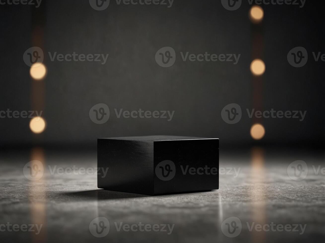 A minimalist black plinth with clean sharp lines ideal for highlighting minimalist objects. photo