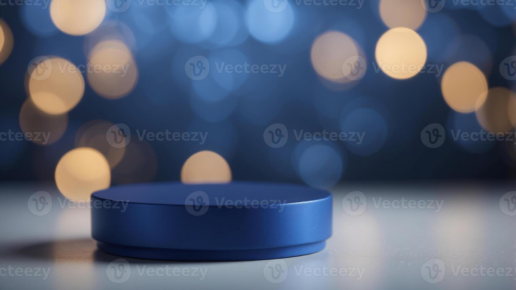 A cylinder pedestal podium display, empty room background, cobalt blue color. photo