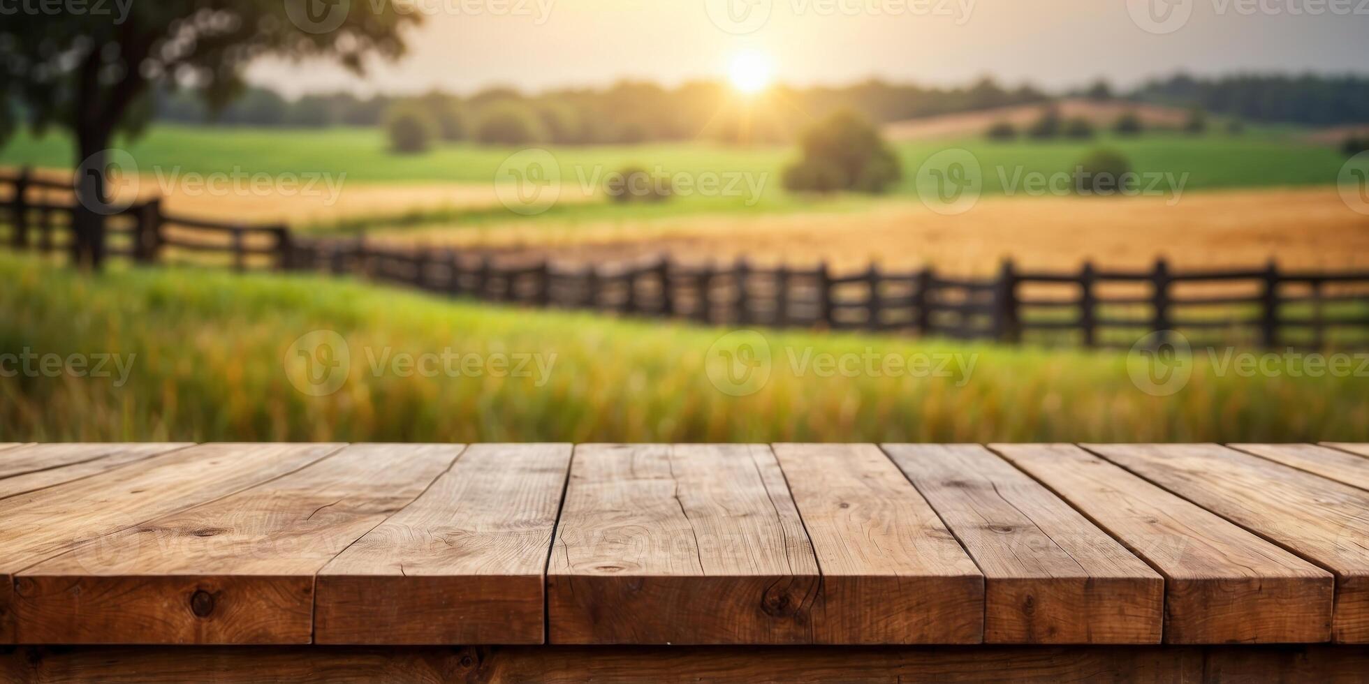 Empty wooden table top with blur background of farm. photo