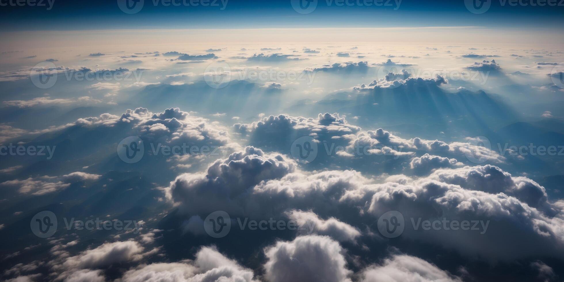 Majestic Aerial View of Fluffy Clouds Blanketing the Earth from High Altitude Flight. photo