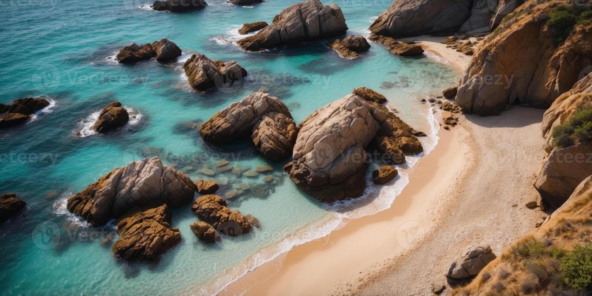 Aerial view of the rocky coast with a beautiful sandy beach and azure water. photo