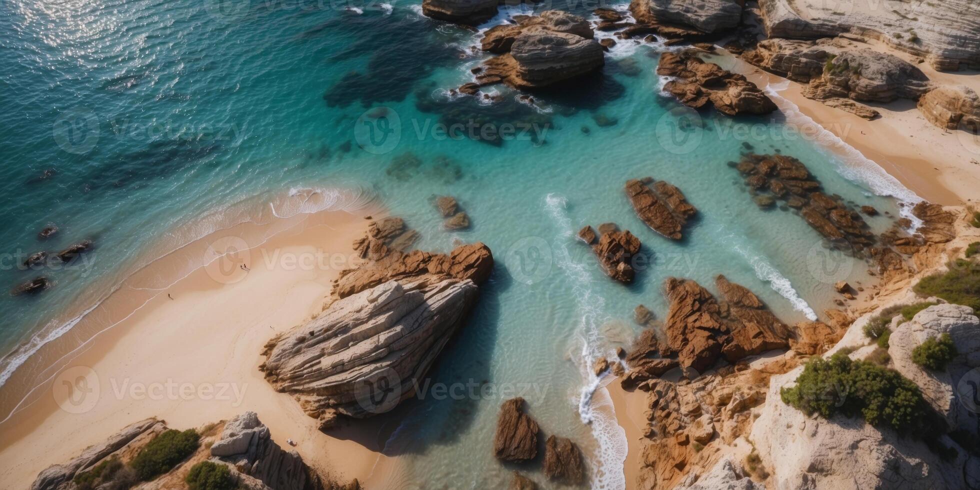 Aerial view of the rocky coast with a beautiful sandy beach and azure water. photo