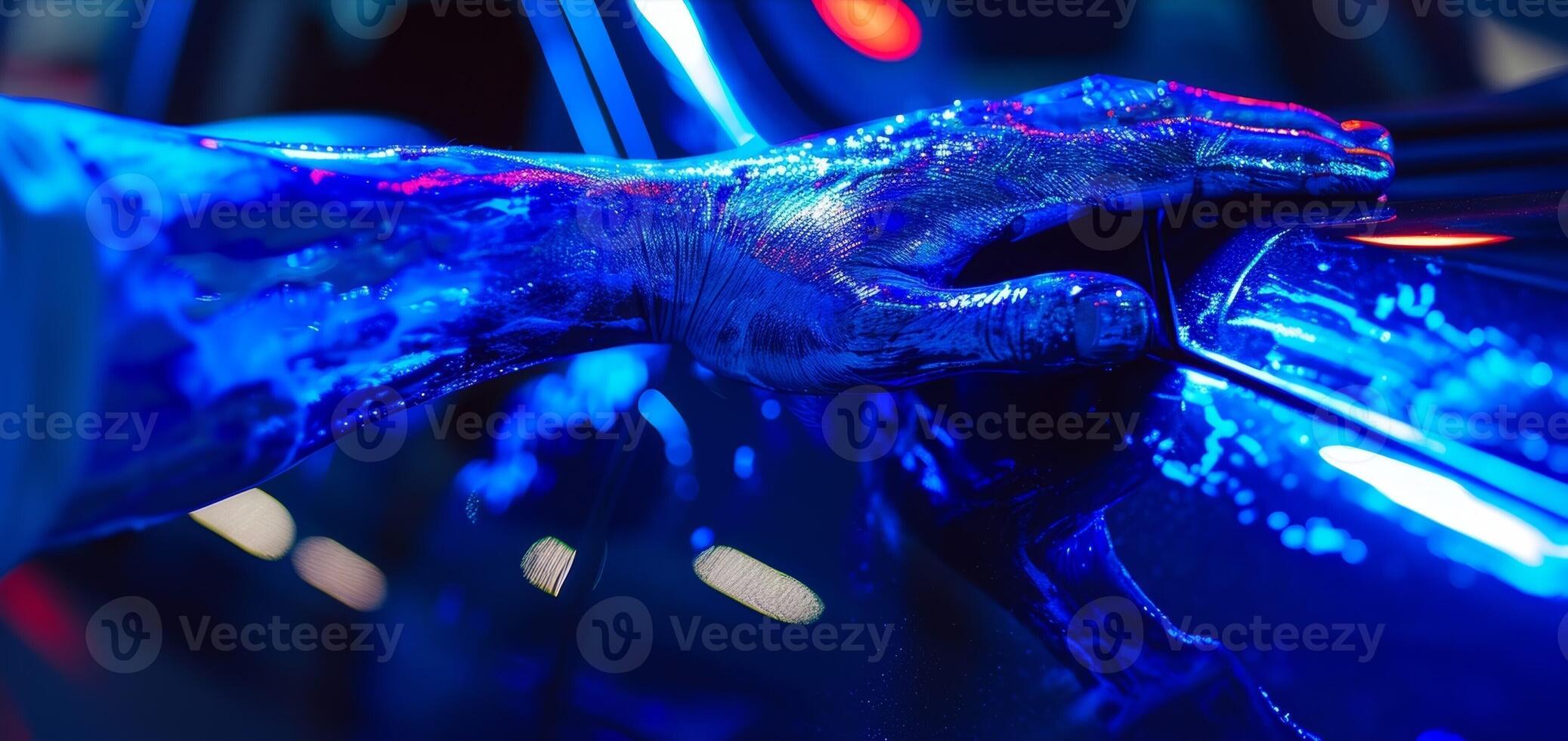 Closeup of a persons hand painted with reflective body paint as they reach out and touch a light source showcasing the paints ability to reflect and enhance light photo
