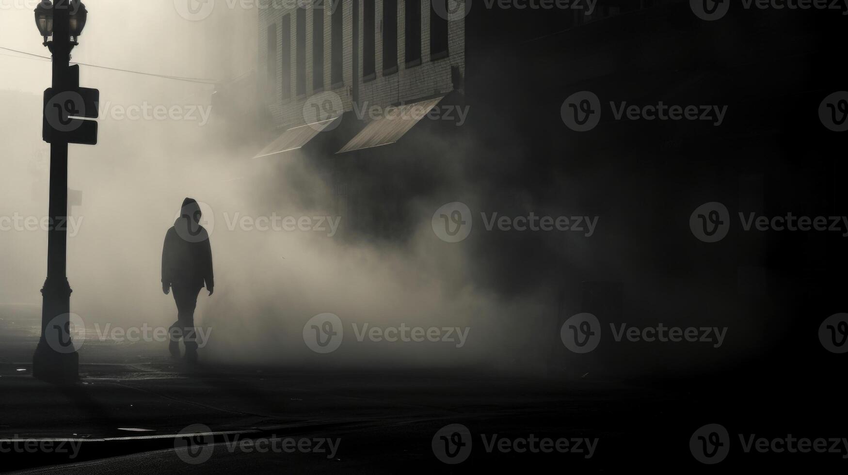 A lone figure walks through a cloud of smoke, their silhouette shrouded in mystery as they navigate the urban landscape. photo