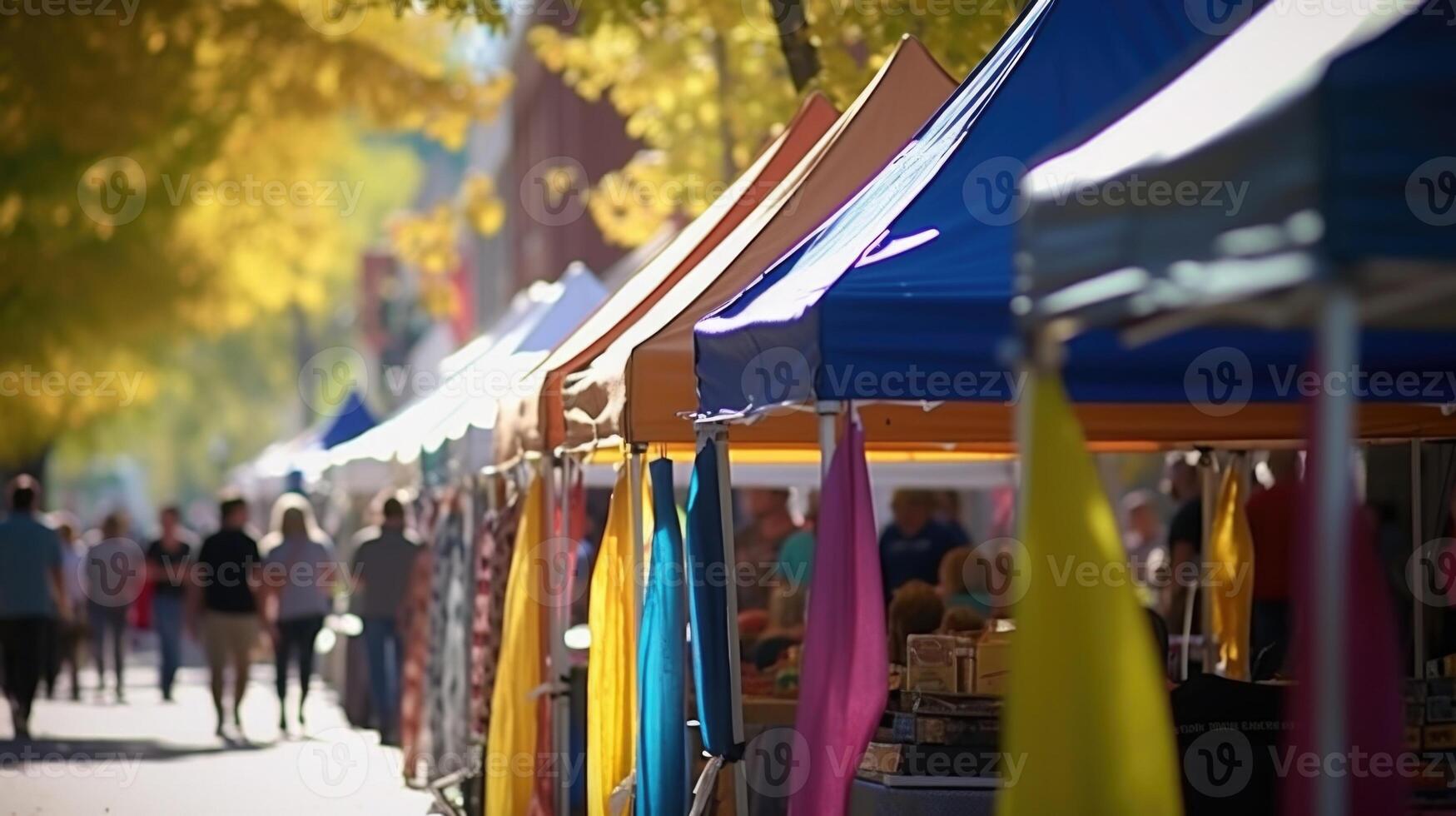 Rows of colorful tents line the street, each one offering a unique selection of goods from the local farmers market. The sound of friendly conversation can be heard as shoppers chat with photo