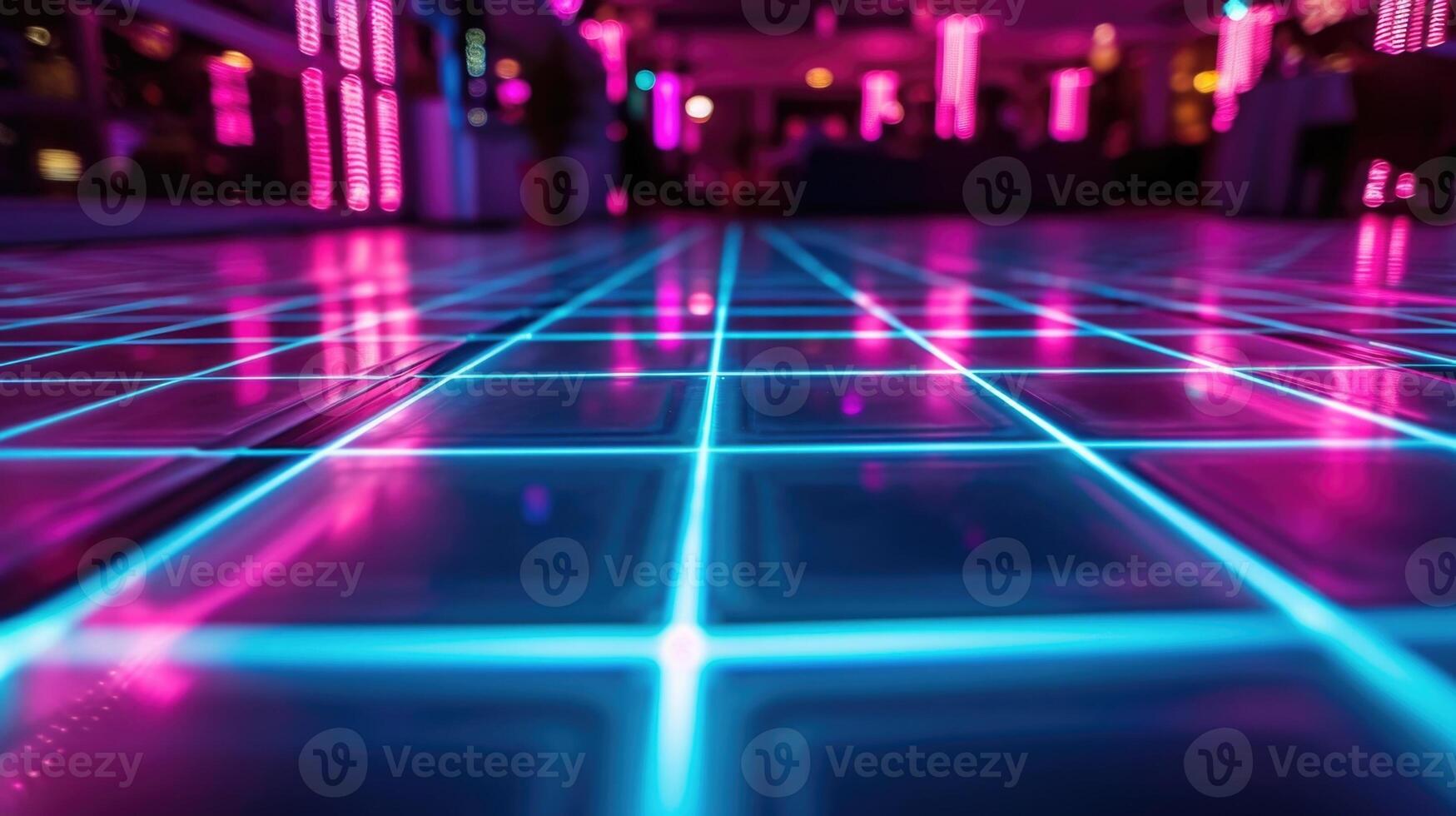 An illuminated neon dance floor inviting attendees to groove under the stars photo