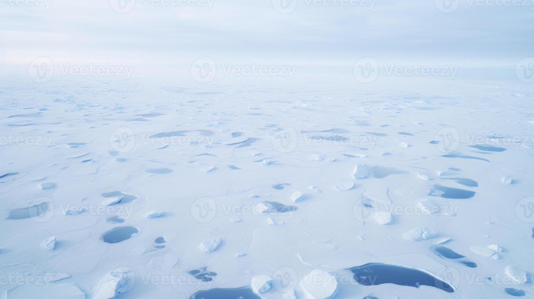 Vast fields of melting ice stretch out beneath the aerial lens, highlighting the devastating effects of climate change on the polar environment. photo