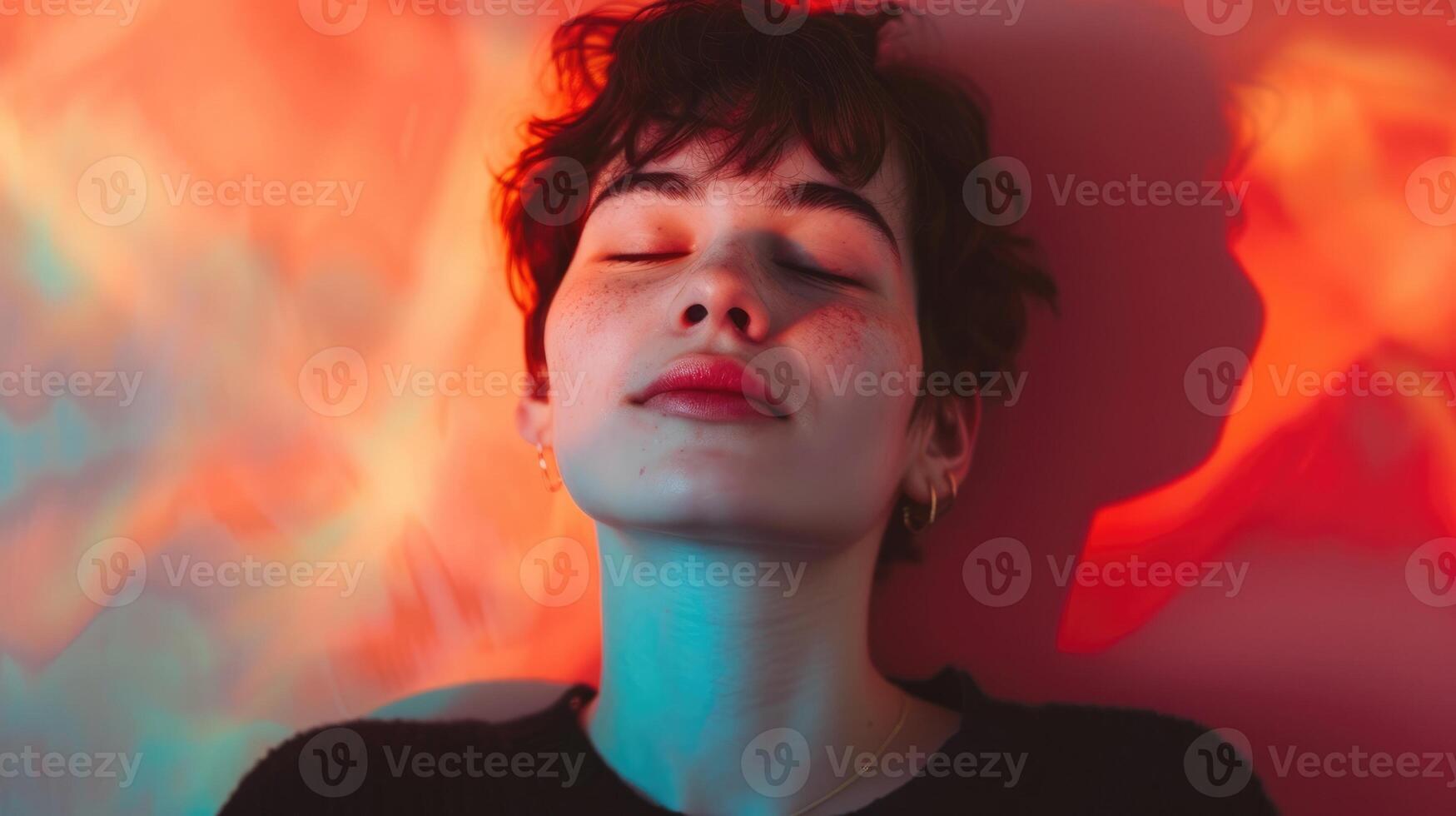 An individual of nonbinary gender with a serene and content expression finally feeling comfortable in their own skin photo